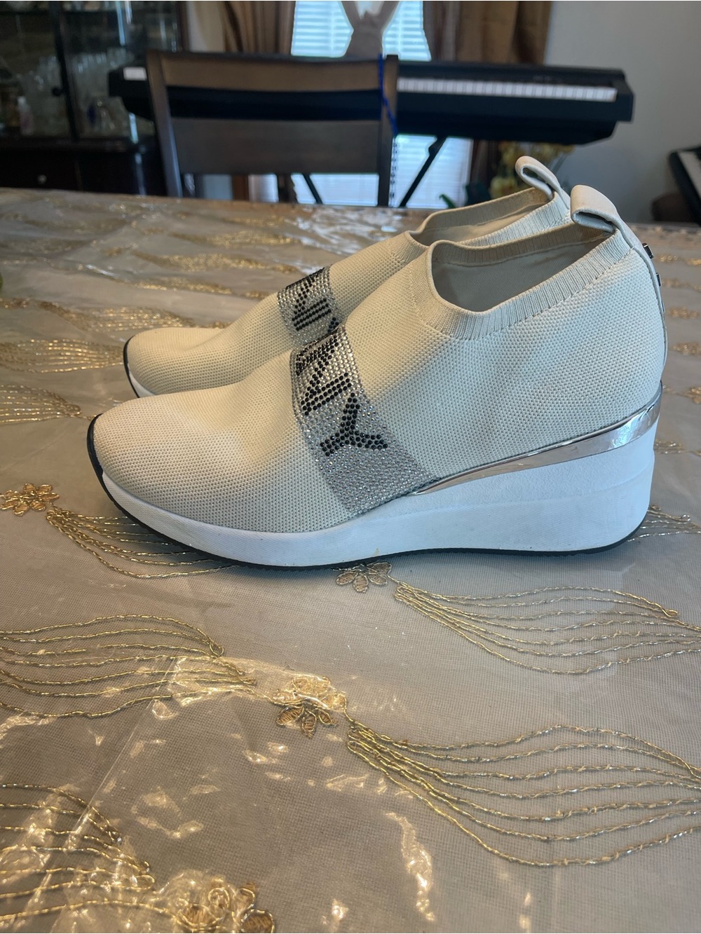 DKNY Cream Knit Slip-On Wedge Sneakers with Silver Trim
